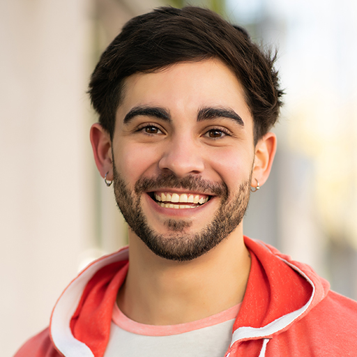 close-up-of-young-man-smiling-outdoors-DELEX88
